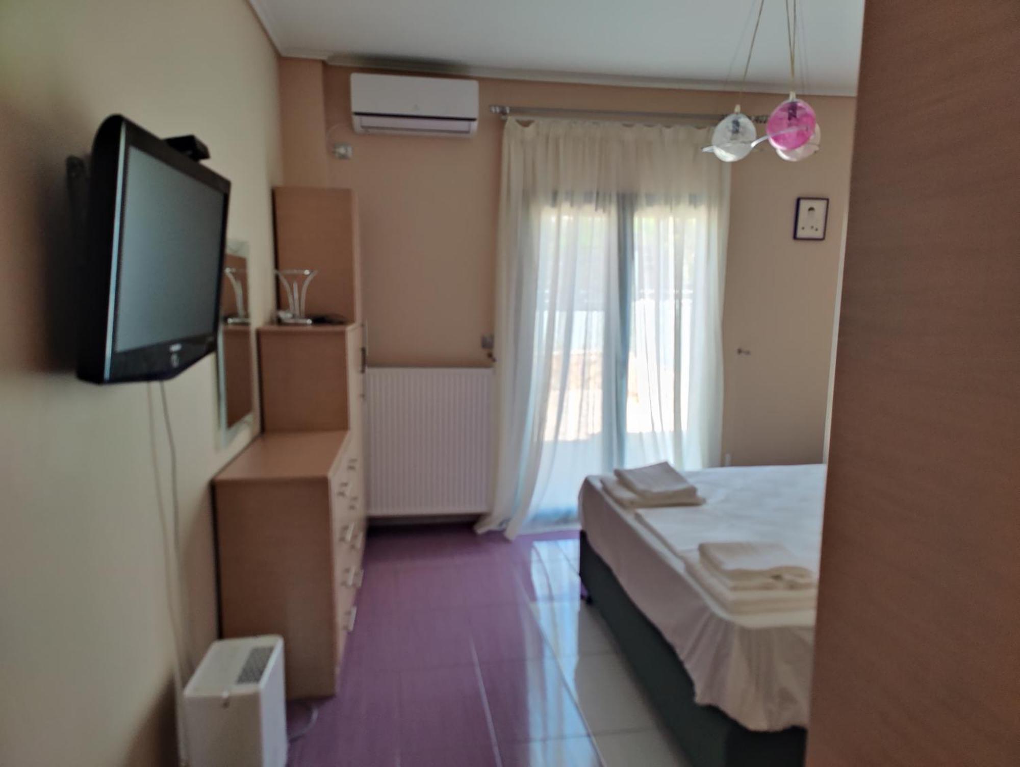 John'S Modern Apartments Artemida Экстерьер фото